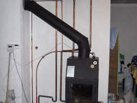 kominek z plaszczem wodnym wspolpracujacy z kotlem gazowym