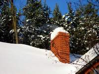 Pierwszy dym z komina - na razie tylko po zainstalowaniu kozy w salonie. Zawsze trochę cieplej.